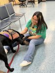 Musician Aaron Fowler came to the library with his a trained therapy dog on Thursday, June 20th to present his “The Adventure Begins Today!” Summer Reading program.