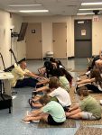 Musician Aaron Fowler came to the library with his a trained therapy dog on Thursday, June 20th to present his “The Adventure Begins Today!” Summer Reading program.