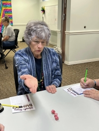 Our February 28th Mardi Gras themed Bunco party was a festive occasion filled with laughter and fun!