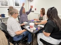 Our February 28th Mardi Gras themed Bunco party was a festive occasion filled with laughter and fun!