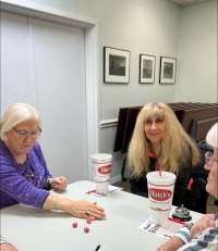 Our February 28th Mardi Gras themed Bunco party was a festive occasion filled with laughter and fun!