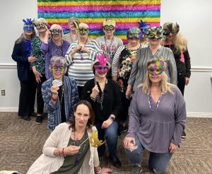 Our February 28th Mardi Gras themed Bunco party was a festive occasion filled with laughter and fun!